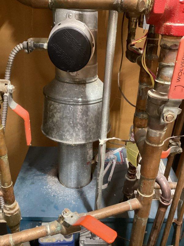 Performed boiler tune-up service on 20-year-old system after customer reported no heat to second floor radiators. Diagnosed airlock in system preventing proper circulation and critically low water pressure. Purged air from the system, restored water pressure to 18psi, verified proper radiator heating throughout the house, and confirmed normal system operation after checking burners, heat exchanger, flue, fresh air intake, pumps, relay controls, gas pressure, and combustion air.