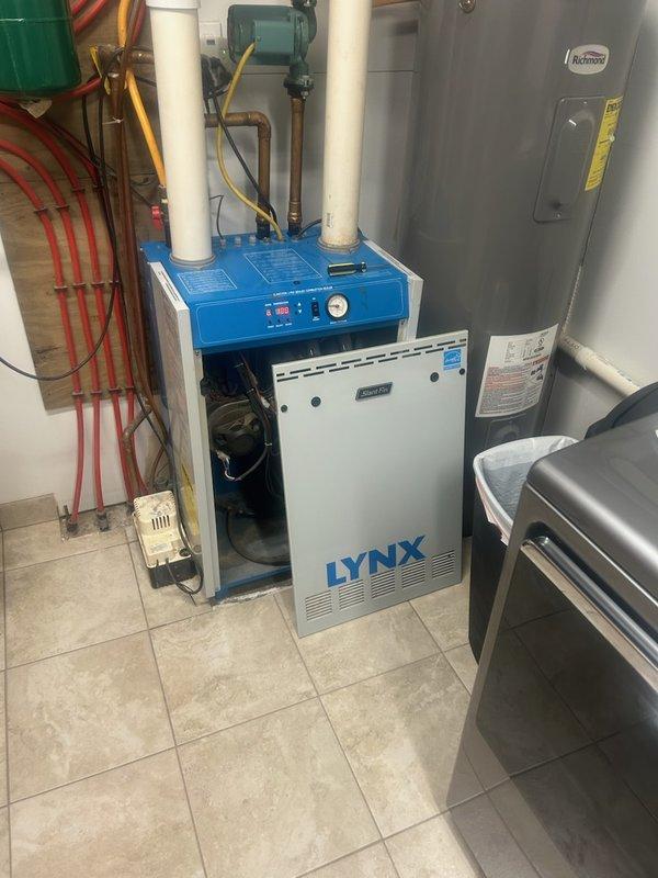 Responded to no heat call for LYNX boiler showing lockout condition that customer had reset twice unsuccessfully. Upon testing, observed boiler firing but quickly overheating, indicating potential issues with either the return pump operating intermittently or the boiler control board failing to properly energize the pump. After system cooldown and retest, all components functioned normally with proper temperature maintenance, suggesting an intermittent fault. Unable to reproduce failure mode for definitive diagnosis; recommended monitoring with potential replacement of pump and/or control board as next troubleshooting steps.