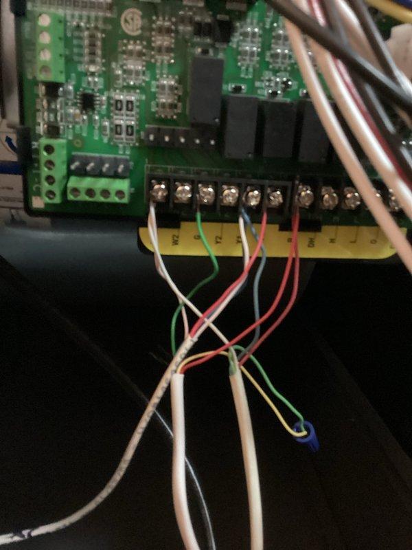 Diagnosed intermittent GFCI tripping causing condensate pump failure and water leakage. Replaced faulty condensate pump and corrected improper low voltage wiring between thermostat, furnace board, and humidifier controls that was causing operational issues. Replaced humidifier controller, verified proper system operation through testing cycle.