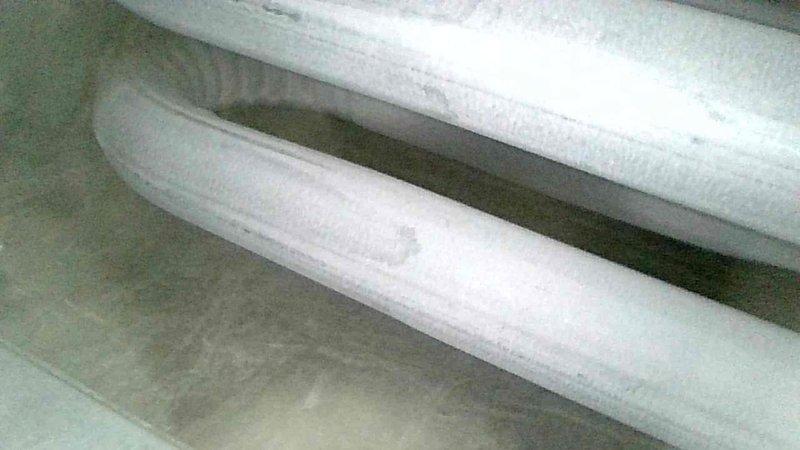 Performed comprehensive furnace tune-up and inspection for real estate transaction. Thoroughly examined heat exchanger (no cracks, holes or rust spots detected), cleaned flame sensor, checked motors and ignitor. Test run confirmed proper gas pressures with 58°F temperature rise and 0.0 ppm carbon monoxide in air stream. Replaced air filter and determined furnace is in fair condition for its age.