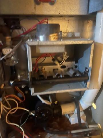 Diagnosed Amana 90 high-efficiency furnace (Model #GUD070X30B) with no heat complaint. Inspection revealed failure of power transmission to ignitor due to defective control board. Provided customer with replacement board options and discussed potential full furnace replacement alternatives.