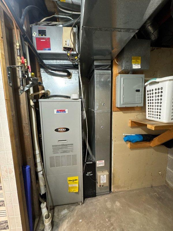 Responded to no-heat service call for a first-generation Heil furnace. Upon inspection, identified cracked secondary heat exchanger with water and combustion gas leakage. Visual inspection with camera confirmed failure to customer. Due to safety concerns and component failure, recommended complete system replacement. Scheduled follow-up consultation with service advisor for replacement options.