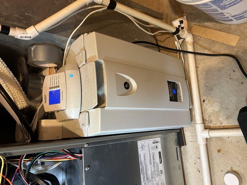 Performed annual maintenance on 1-year-old furnace including operational testing, temperature rise and gas pressure verification with minor low-fire pressure adjustment, drain cleaning, and component inspection. System functioning properly with recently changed air filter and serviceable humidifier pad.