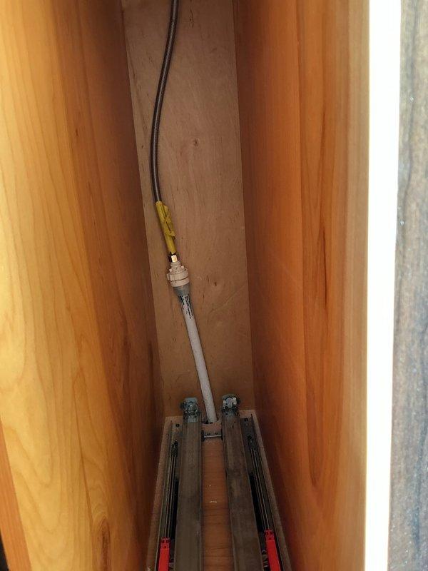 Responded to service call for pot filler leaking from the joint between spout and deck mount. Diagnosed issue with leakage at base. Replaced cartridge and installed new O-rings on the spout assembly to resolve the leak.