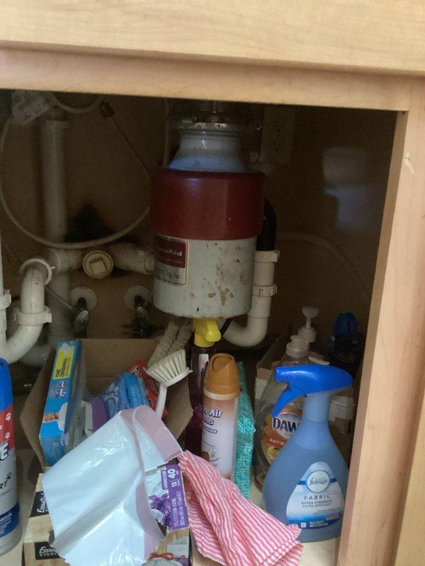 Successfully cleared recurring kitchen sink clog by using drain snake to remove obstruction. Inspected garbage disposal unit and associated PVC plumbing connections under sink cabinet; all were functioning properly after service. Recommended routine maintenance to prevent future blockages.