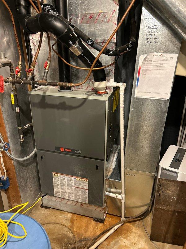 Performed tune-up inspection on Trane furnace. Diagnostic testing with Testo 310 II analyzer revealed compromised heat exchanger despite 95.9% efficiency readings. Identified and removed blocked damper affecting airflow to basement. Adjusted remaining dampers to improve circulation. Due to heat exchanger issues, removed control board and scheduled follow-up estimate for furnace replacement.