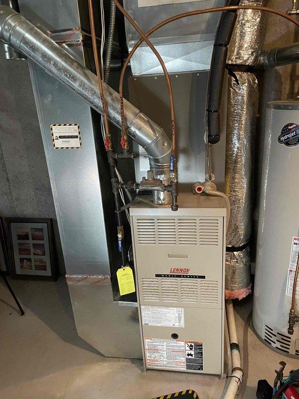 Responded to no-heat call for 20-year-old Lennox furnace that was blowing cold air. Diagnosed furnace in limit error upon arrival. Checked all limit switches and rollout sensors, confirming all were closed. Reset furnace which restored normal operation through multiple test cycles. Identified and replaced heavily clogged air filter (unchanged since March), then verified proper operation with temperature differential of 51°F, which is within manufacturer specifications.