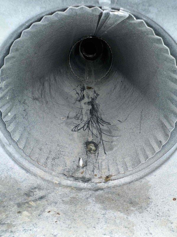 Performed comprehensive duct cleaning service to address significant dust and debris accumulation observed in the HVAC ductwork. Removed extensive buildup of dust, cobwebs, and lint deposits that had formed throughout the spiral metal ducts, restoring proper airflow and improving system efficiency.