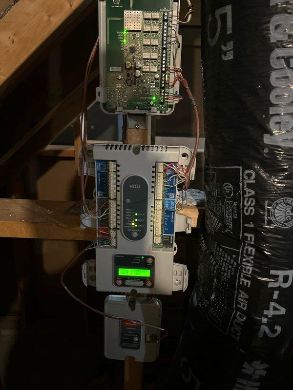 Replaced faulty HZ322 TRUEZONE PANEL with new control board per PO #197474-001. Installation completed successfully; however, encountered connectivity issues with third thermostat. Scheduled follow-up with electrician to resolve remaining zone connection problem and verify if thermostat requires updating.