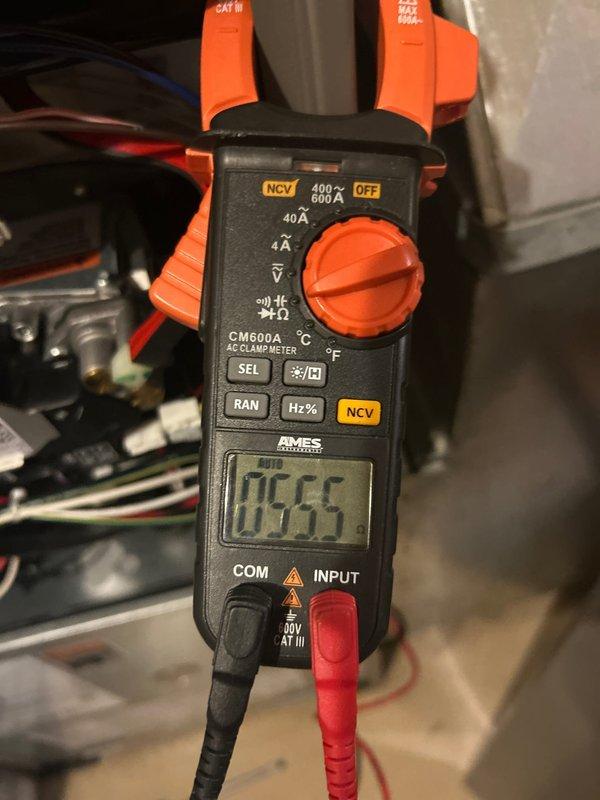 Performed routine biennial furnace tuneup on 2-year-old system. Conducted full diagnostic inspection including circuit board examination and amperage testing with clamp meter, confirming proper electrical operation at 0.555 amps. No issues or concerns identified; system operating within manufacturer specifications.