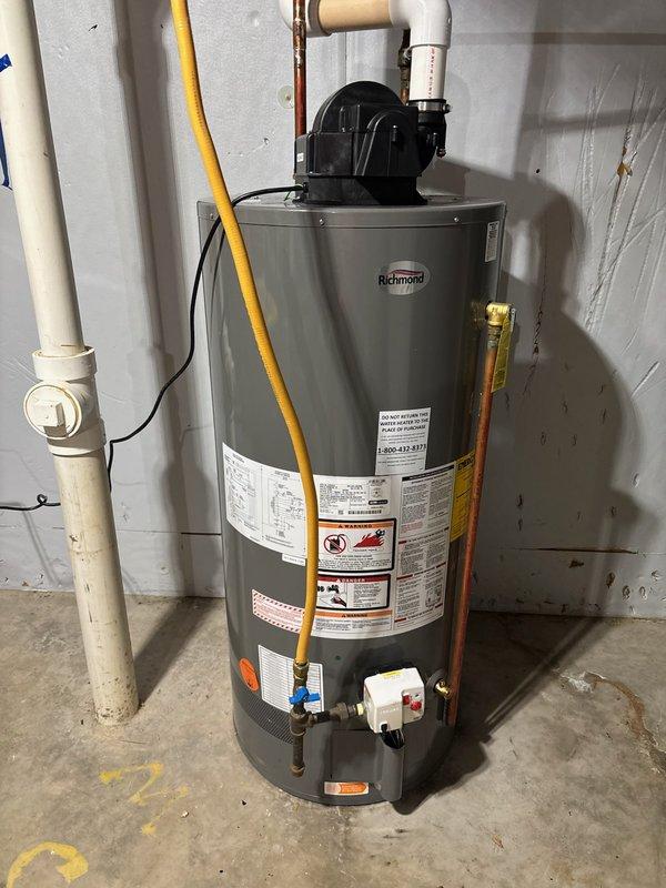 Replaced incorrectly supplied LP water heater with appropriate natural gas model after customer reported no hot water. Original unit had been installed by third party approximately one month prior. Verified proper installation of new water heater with all gas, water, and vent connections secured and functioning correctly.