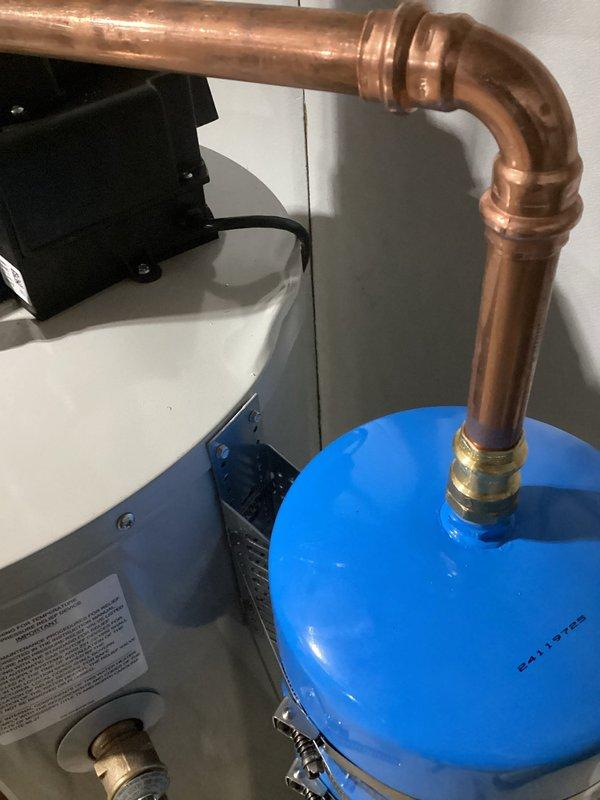 Replaced incorrectly supplied LP water heater with appropriate natural gas model after customer reported no hot water. Original unit had been installed by third party approximately one month prior. Verified proper installation of new water heater with all gas, water, and vent connections secured and functioning correctly.