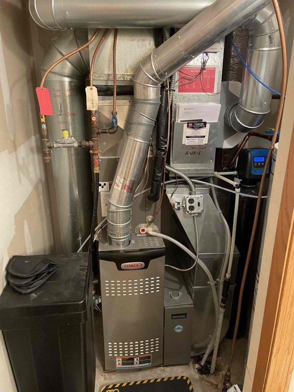 Performed routine maintenance on 1-year-old furnace and humidifier, both functioning properly with no issues detected. Inspected system components and discussed filter replacement options with customer, who elected to order filters independently for future service visits. Completed comprehensive furnace tune-up with installation of new air filter.