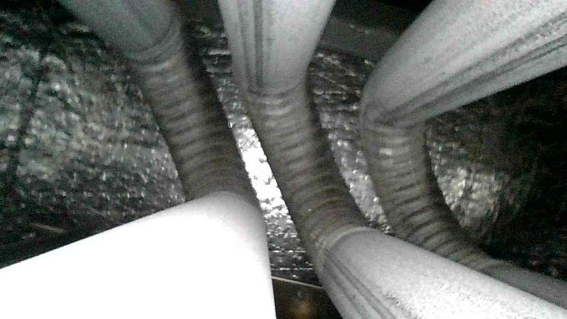 Responded to no-heat call for 3-year-old furnace system. Diagnosed issue with incomplete burner ignition where only 2 of 3 burners were lighting. Removed spider web obstruction from final burner orifice, cleaned all burners/orifices, and replaced heavily clogged air filter that was being pulled into blower. Verified proper thermostat wiring and programming. Tested system through multiple cycles confirming proper operation including second stage activation.