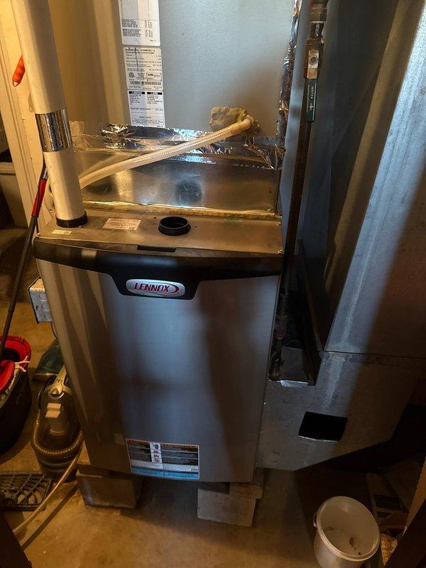 Performed annual maintenance on 3-year-old Lennox gas furnace with expected lifespan of 15-20 years. Verified proper operation including gas pressure, electrical connections, and motor amp draws. Cleaned flame sensor, inspected ignitor functionality, confirmed clear condensation drains, and examined filter which was in good condition.