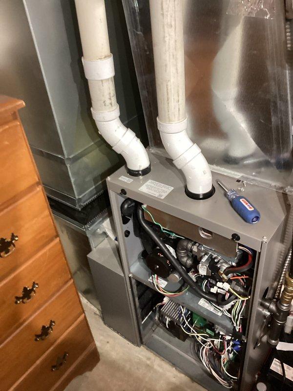 Performed annual furnace tune-up on 1-year-old high-efficiency gas furnace per maintenance agreement. Cleaned condensate and flame sensor, conducted complete operational check of system. Unit functioning properly with no issues identified.
