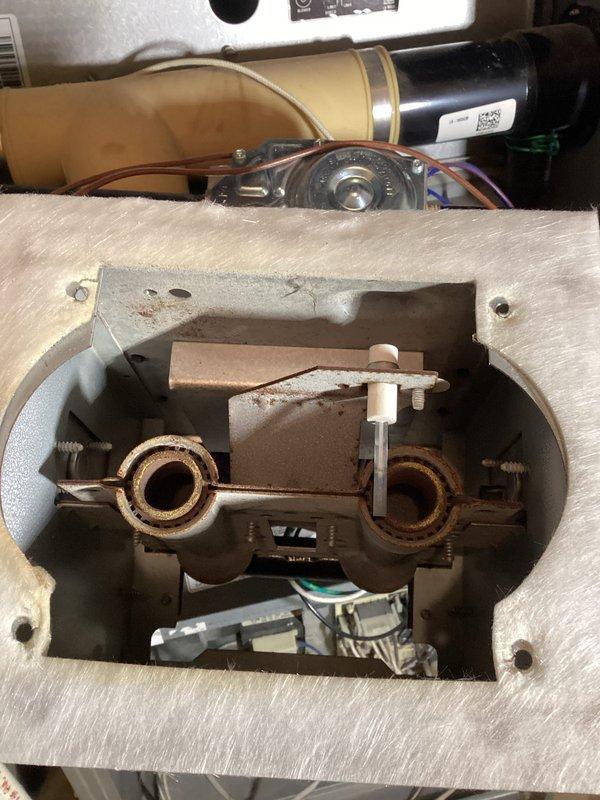 Conducted tune-up on 19-year-old FA furnace including inspection of venting, exhaust flue, heat exchanger (via camera), burners, blower, inducer, pressure switches, safety and limit switches, flame sensor and igniter. Verified gas pressures, combustion air, and system cycling. Found high resistance in ignitor and noisy inducer operation requiring replacement. System currently operating normally despite these issues.