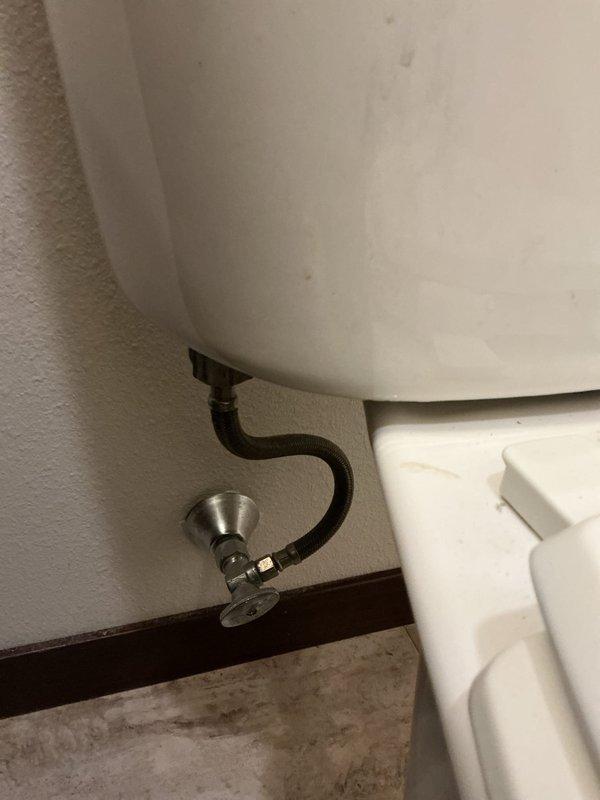 Diagnosed and replaced damaged internal toilet components. Removed tank lid to access and replace broken fitting and malfunctioning flush mechanism. Installation included new toilet "guts" to restore proper operation.