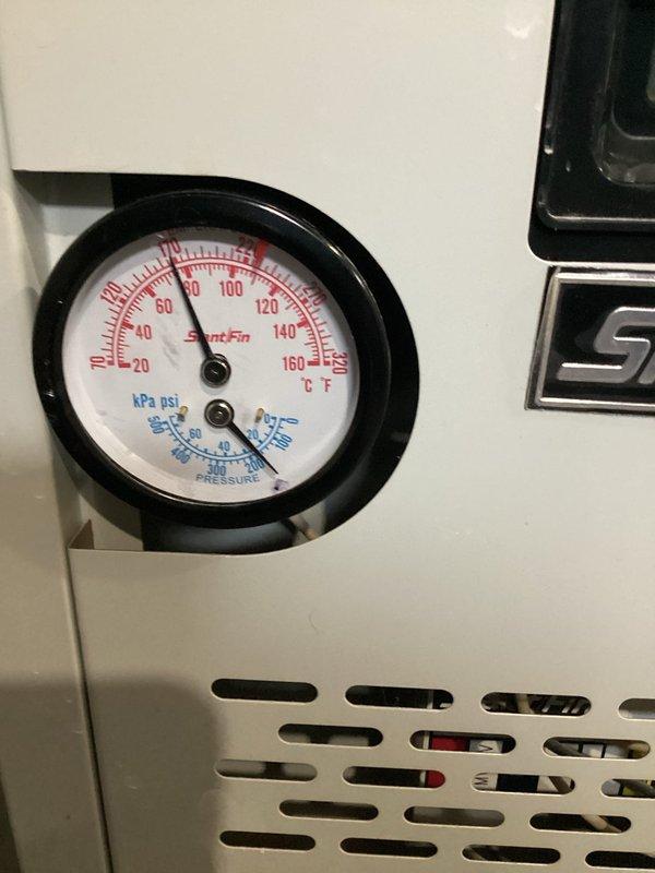 Performed comprehensive tune-up on SlantFin boiler (6 years old). Inspected heat exchanger, cleaned burners, verified flue condition, and checked pump functionality. Found bedroom zone valve defective and replaced it. Adjusted gas pressure, verified combustion air, and cycled system to confirm proper operation. Recommended resealing collector box to prevent exhaust leakage into living space. System now functioning normally with all zones operating correctly.