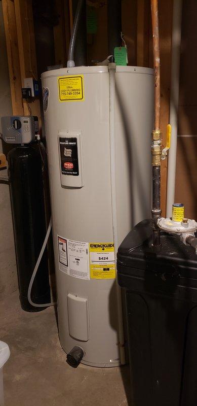 Completed comprehensive plumbing inspection of property focusing on three key issues: non-functioning instant hot water spout at kitchen sink, water softener system, and water heater evaluation. Observed resin deposits in toilets indicating possible water softener malfunction. Documented existing equipment condition with photos and provided customer with detailed recommendations for necessary repairs.