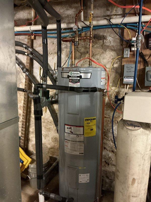 Responded to customer report of no hot water from 50-gallon electric Smith water heater installed approximately 2 years ago. Diagnostic testing revealed failed heating elements and thermostats. Replaced both thermostats and elements to restore proper heating function, resolving the no hot water issue. Also addressed reported leak from bottom of unit during service visit.