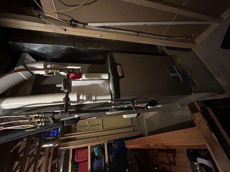 Responded to alert code 31 on thermostat for heat system with communication failure. Replaced thermostat which resolved initial code issue, however discovered no power to outdoor heat pump. Located tripped breaker that would not reset even after disconnecting heat pump. Determined electrical issue beyond HVAC scope; customer advised to schedule electrician to inspect circuit/breaker.