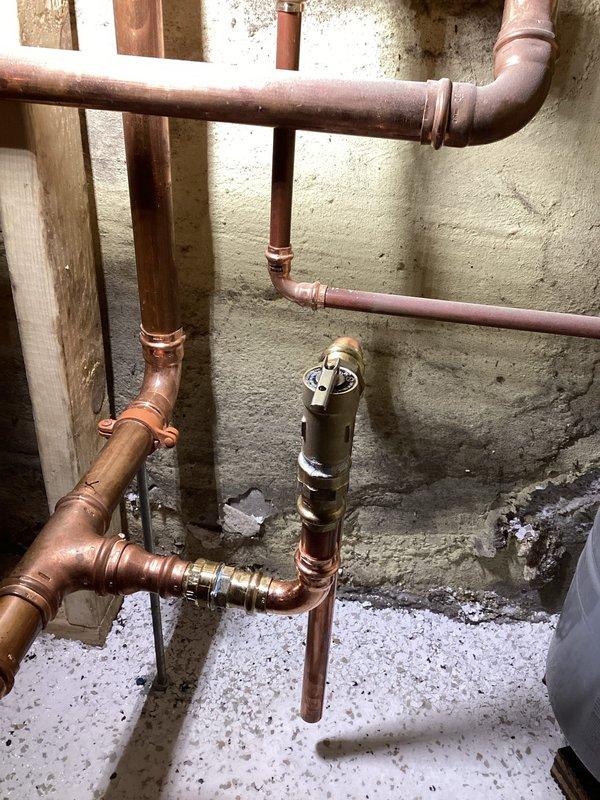 Successfully completed a code compliance correction by reinstalling the pressure relief valve on the boiler's heating side from a horizontal to vertical position. Took photographic documentation of the completed installation and forwarded images to the permits department as required for the previously failed inspection.