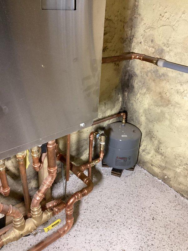Successfully completed a code compliance correction by reinstalling the pressure relief valve on the boiler's heating side from a horizontal to vertical position. Took photographic documentation of the completed installation and forwarded images to the permits department as required for the previously failed inspection.