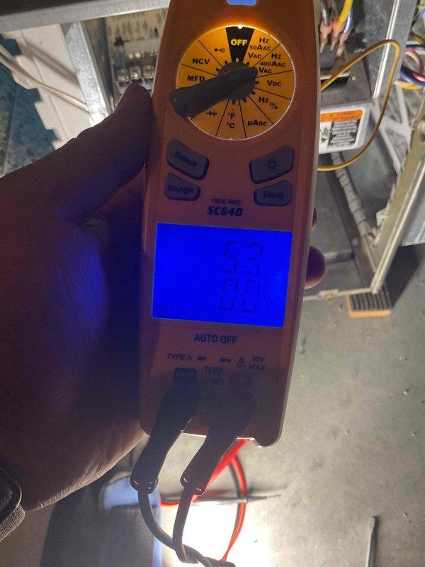 Completed maintenance check on aging furnace with unknown FRP. Discovered secondary heat exchanger beginning to leak, along with dirt buildup on heat exchanger tubes and a clogged filter. Temperature readings measured at 59/70.2. System still maintaining acceptable CO levels, but secondary heat exchanger was replaced due to age and early stage leak detection to prevent future failure.