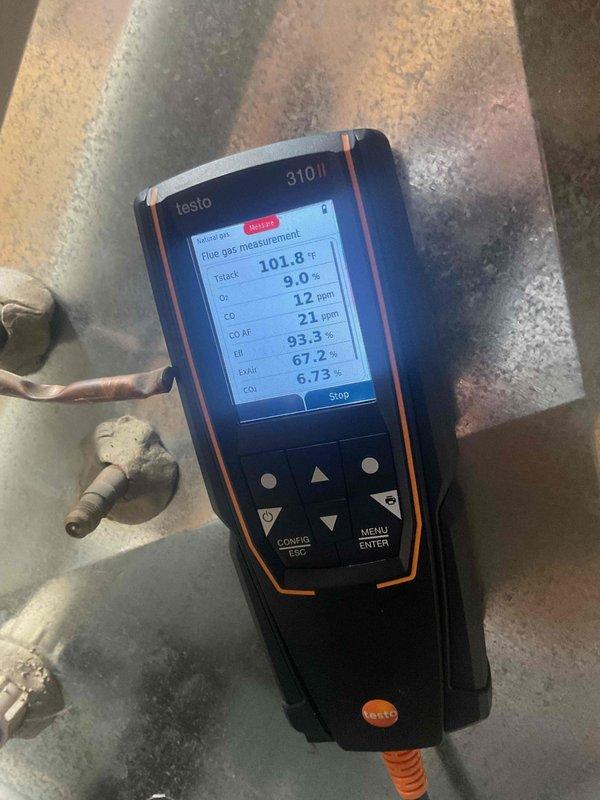 Responded to no-heat call on aging Goodman furnace that was previously serviced for a leak. Diagnosed issue with sticking door switch that was preventing proper operation. Restored normal functionality by adjusting the door switch mechanism. Performed combustion analysis with Testo 310 II, confirming system is now operating within acceptable parameters (CO: 21ppm, efficiency: 67.2%).