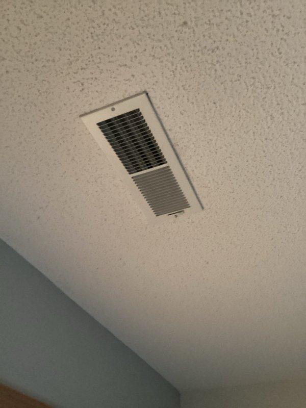 Responded to customer complaint of loud banging noise from vents during furnace operation in a recently installed system. Removed vent diffusers and adjusted accessible ductwork. Cycled system multiple times with no recurrence of noise. Verified thermostat functioning properly at 69°F setpoint with system responding appropriately.