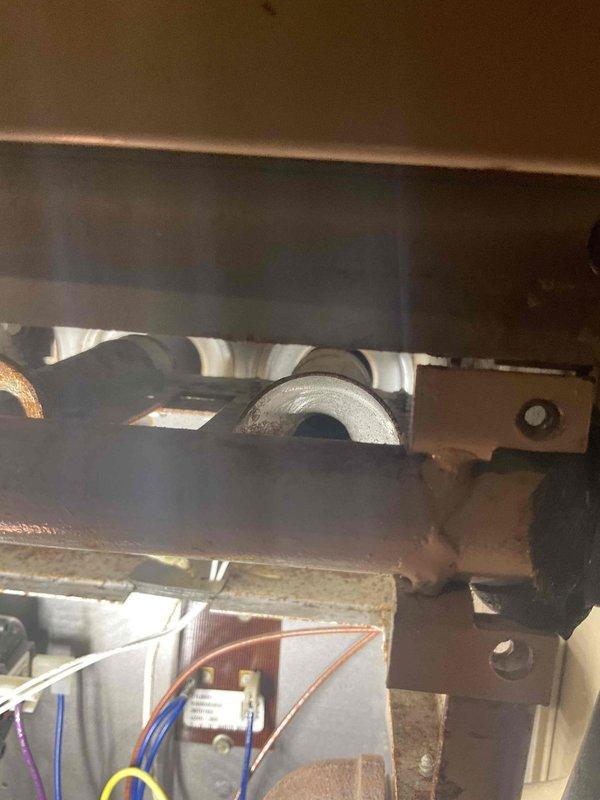 Performed seasonal HVAC maintenance tune-up on 22-year-old furnace system. Diagnostic testing completed with readings within acceptable parameters. Inspection revealed rust development in heat exchanger and burners. Advised customer to consider system replacement due to advanced age and potential for future reliability issues.