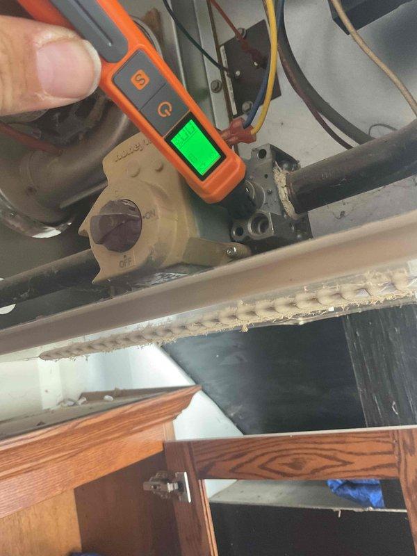 Responded to no-heat call for 15+ year old natural gas garage heater with inoperative blower motor. Found gas supply to garage was shut off. Performed diagnostic testing on control valve and blower motor assembly, verified proper voltage with multimeter. Restored heat functionality by turning on gas supply and ensuring proper ignition sequence.