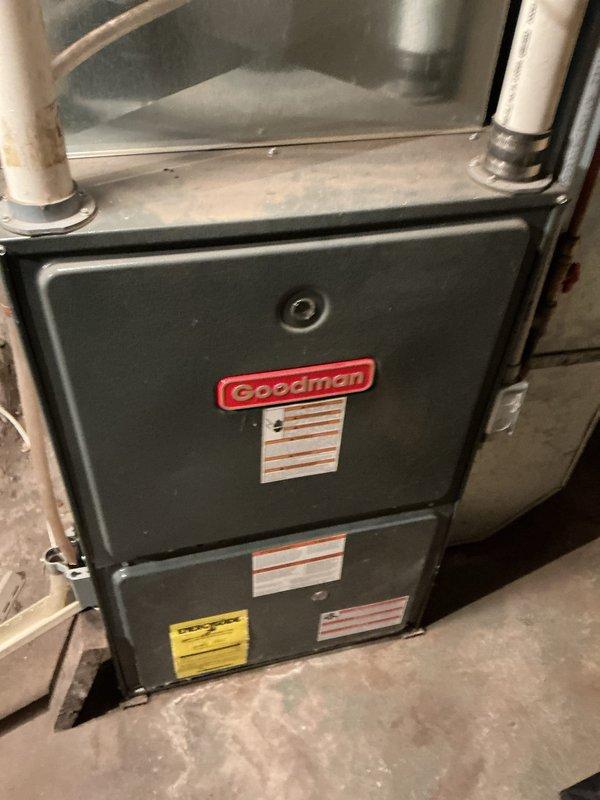 Serviced 17-year-old Goodman high efficiency furnace that was failing to ignite consistently. Diagnosed issue with flame transfer between burners. Thoroughly cleaned all four burners, resulting in proper flame travel and reliable operation. System is now functioning correctly but due to age, recommended comfort advisor consultation.