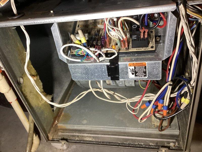 Performed membership tune-up service on dual furnace system. Completed comprehensive inspection of both units including heat exchangers, venting, burners, blower components, safety switches, gas pressures, and flame sensors. Main furnace operating normally; replaced clogged humidifier drain line. Secondary furnace showed wear and rusting on heat exchanger; adjusted low gas pressure settings for proper LP gas operation. Both systems verified for safe operation following service.