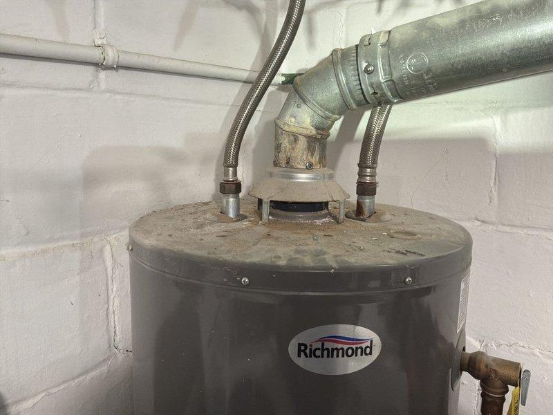 Replaced customer's failing water heater due to declining hot water pressure throughout the property. After diagnostics traced pressure issues to the existing unit, installed new 40-gallon atmospheric Richmond water heater with proper connections to existing plumbing and ventilation system.