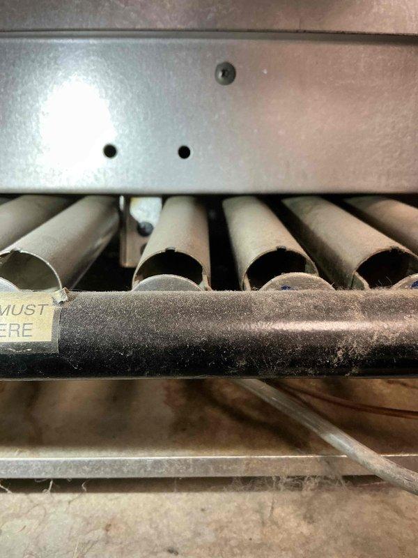 Performed annual maintenance on 14-year-old Burnham natural gas boiler with hydronic radiant heating system. Inspection revealed good condition of piping, expansion tank, heat exchanger, pressure relief valve, and backflow prevention. Identified one zone valve motor that opens but fails to make its end switch for boiler activation. Combustion analysis showed safe operation with minor heat exchanger seal deterioration (1 ppm leakage) requiring future monitoring.