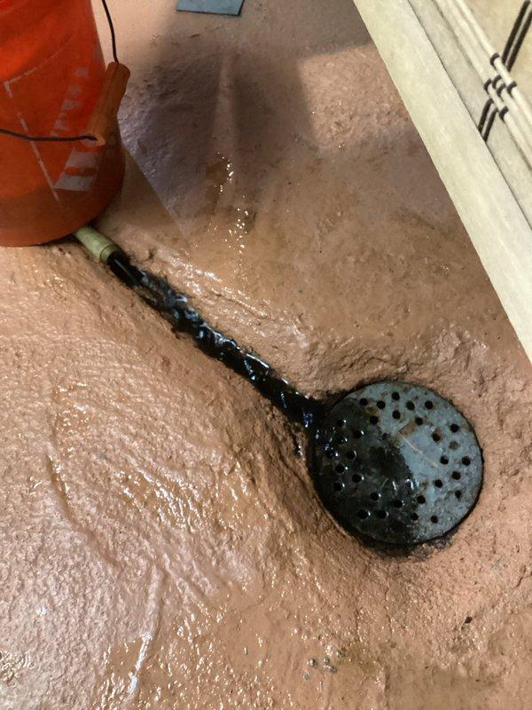 Performed second Fernox treatment service by draining and flushing the hydronic system. Added Fernox Water Protector F1, filled system and bled all radiators. Identified pilot flame improperly positioned below hood; tightened connections and relit pilot. Inspected burners and heat exchanger with system now operating normally.