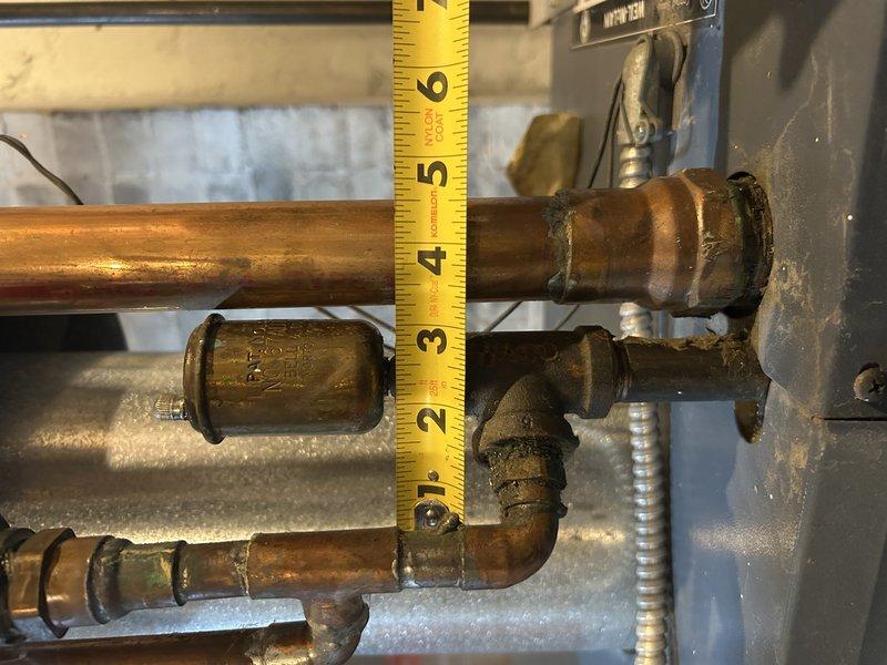 Performed boiler tuneup on 3-year-old unit reporting gurgling noises in radiators. Bled significant air from upstairs radiator to address noise issue. Identified multiple system issues including rapidly increasing pressure, flooded expansion tank without isolation valve, seized isolation valves, leaking auto air vent, backflow preventer, and relief valve. Maintained safe system operation by releasing water during test run to prevent relief valve activation. Scheduled follow-up for complete boiler re-pipe including replacement of all isolation valves, adding expansion tank isolation, and replacing failing components.