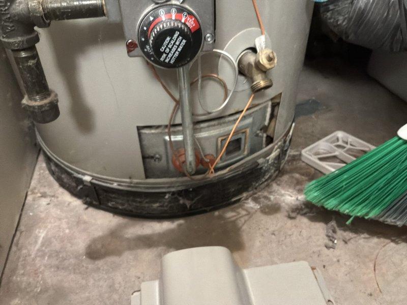 Diagnosed 20-year-old water heater with intermittent pilot light failure due to faulty gas valve. Identified leaking temperature/pressure relief valve and confirmed water softener malfunction with hardness test showing 19 grains. Provided customer with replacement options for both the water heater and water softener.