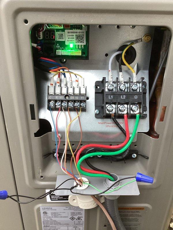 Performed warranty repair on Lennox EL18KSV heat pump system with E30 smart hub. Replaced defective E30 control board at the furnace and outdoor temperature sensor due to error code. After installation, programmed the board, verified all connections, cycled the system to test both heat pump and furnace operation, and successfully reconnected the system to Wi-Fi and Lennox server. System now operating normally.