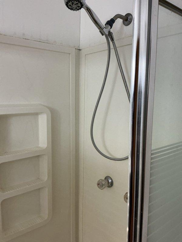 Performed annual plumbing inspection of residence, identifying and resolving leaking packing nuts on both hot and cold water spigots for washing machine. Tightened packing nuts to restore proper seal and eliminate leaks.