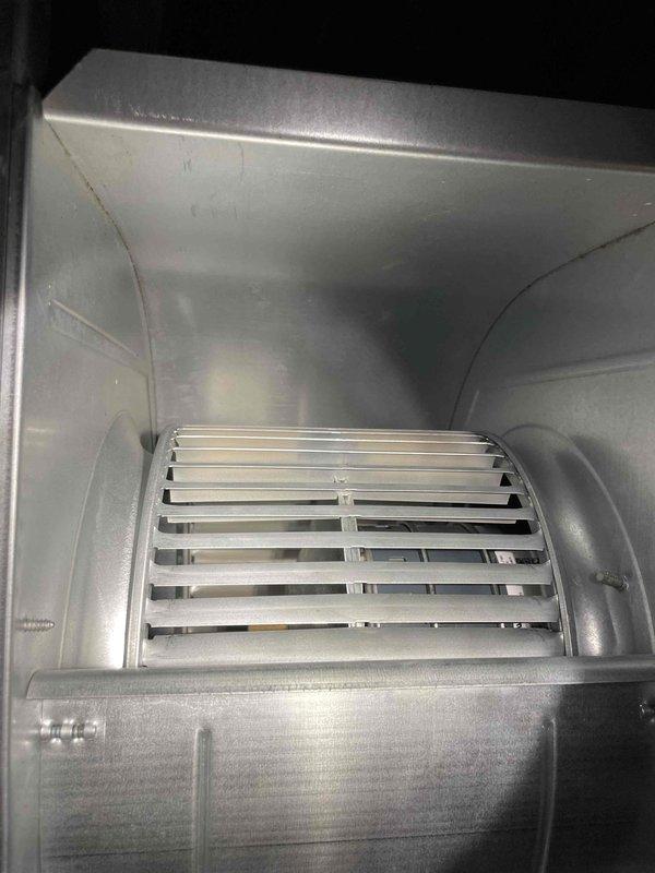 Performed warranty service to replace missing bolt for blower mount assembly. Installed carrier bolt for motor bracket, securing the blower assembly to housing. Verified proper operation after installation; unit functioning correctly with no additional components required.