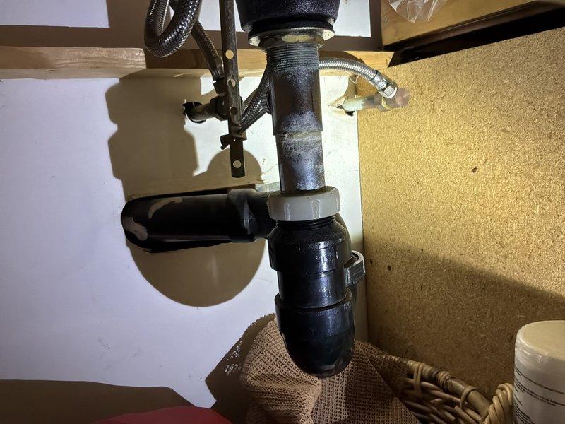 Inspected customer-supplied faucet installation project and provided options for replacing two faucets with new stops. Evaluated existing plumbing configuration including garbage disposal connection and P-trap assemblies. Customer will consider the proposed options before scheduling the installation work.