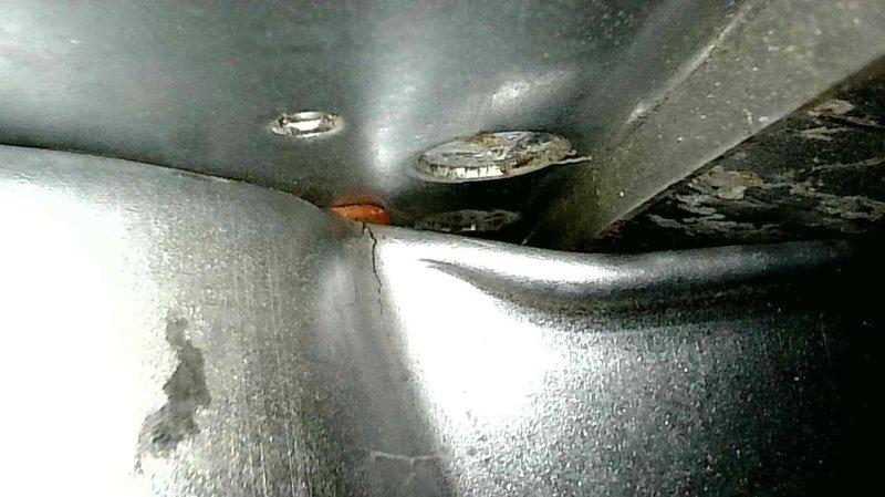 Performed diagnostic inspection on LP furnace with no heat complaint. Identified multiple critical issues: control board failure (no power to combustion blower), severely plugged burners, and cracked heat exchanger beneath burner inlet. Tagged unit out of service due to safety hazards. Customer advised of findings and scheduled for replacement consultation due to age and condition of equipment.