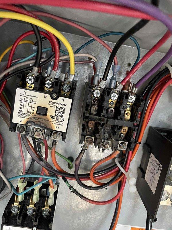 Performed semi-annual preventative maintenance on two RTUs including filter replacement (4-20x25x2 and 4-25x25x2), cleaning flame sensors and spark rods, and blowing out pressure switch hoses and ports. Identified failed contactors on the kitchen/south side unit causing continuous condenser fan motor operation; prepared and submitted estimate for replacement contactors to owner after discussing findings with on-site manager.