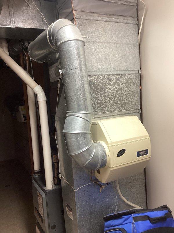 Diagnosed non-operational humidifier issue in Amana HVAC system. Located functional transformer but determined humidistat was faulty and not sending power to solenoid valve. Replaced humidifier pad, cleaned tray and drain, adjusted damper to winter position, and verified water supply. Ordered replacement humidistat per customer's preference over complete humidifier replacement.