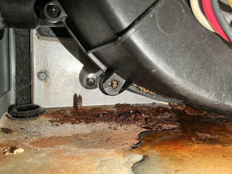 Responded to a no-heat call for an 11-year-old Lennox furnace that was disconnected from the smart hub. Diagnostic testing revealed a failed smart hub and water leakage from the inducer motor, with evidence of significant wood deterioration and metal corrosion around the mounting surface. Replaced the smart hub, inducer motor, and collector box to restore proper heating function.