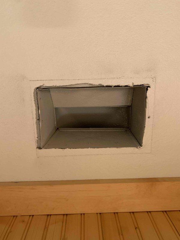 Completed duct cleaning service as part of installation package. Inspected and cleaned ductwork connected to wall-mounted air vents, ensuring proper airflow and system efficiency. Verified installation integrity of rectangular metal vent access points throughout the home.
