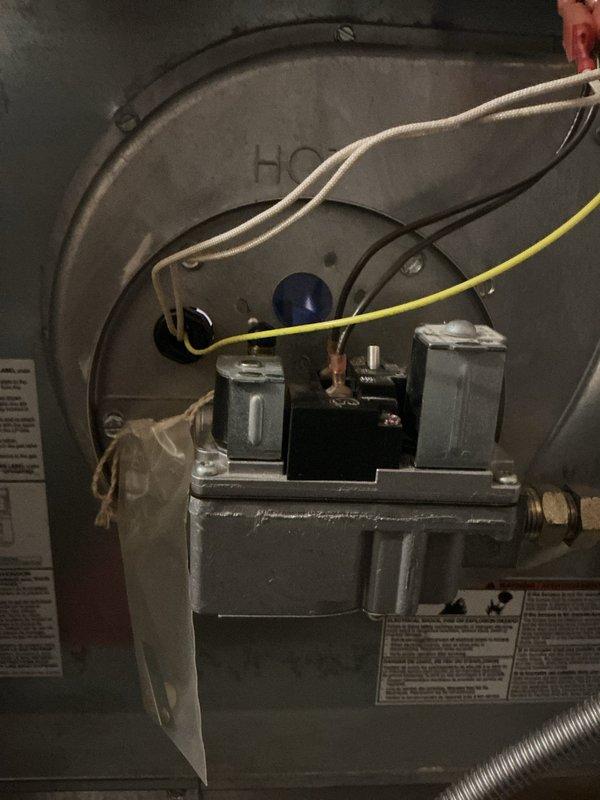 Responded to no heat call for 15-year-old trailer furnace blowing lukewarm air. Inspection revealed faulty roof jack requiring replacement. Submitted parts requisition form and photographed gas valve assembly and blower components for documentation. Customer will receive estimate for approval before proceeding with specialized repair.